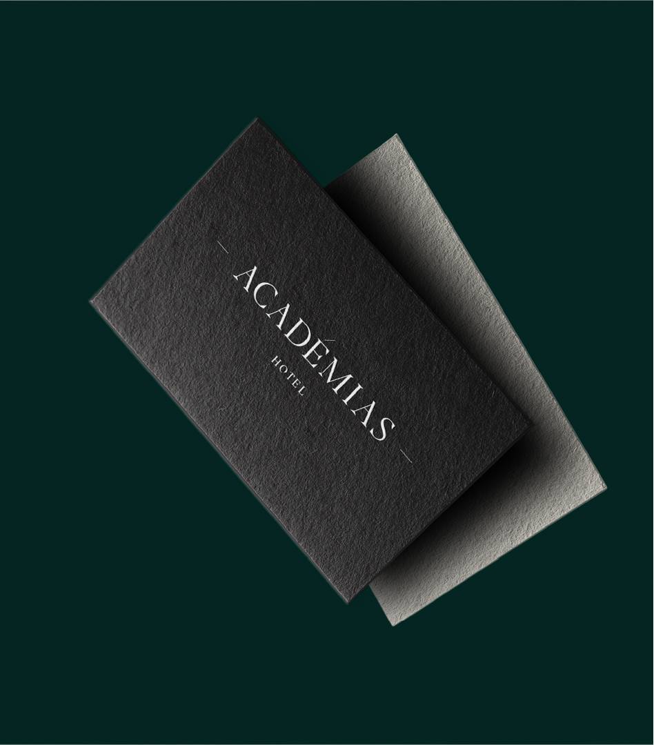The backside of the Academias business cards