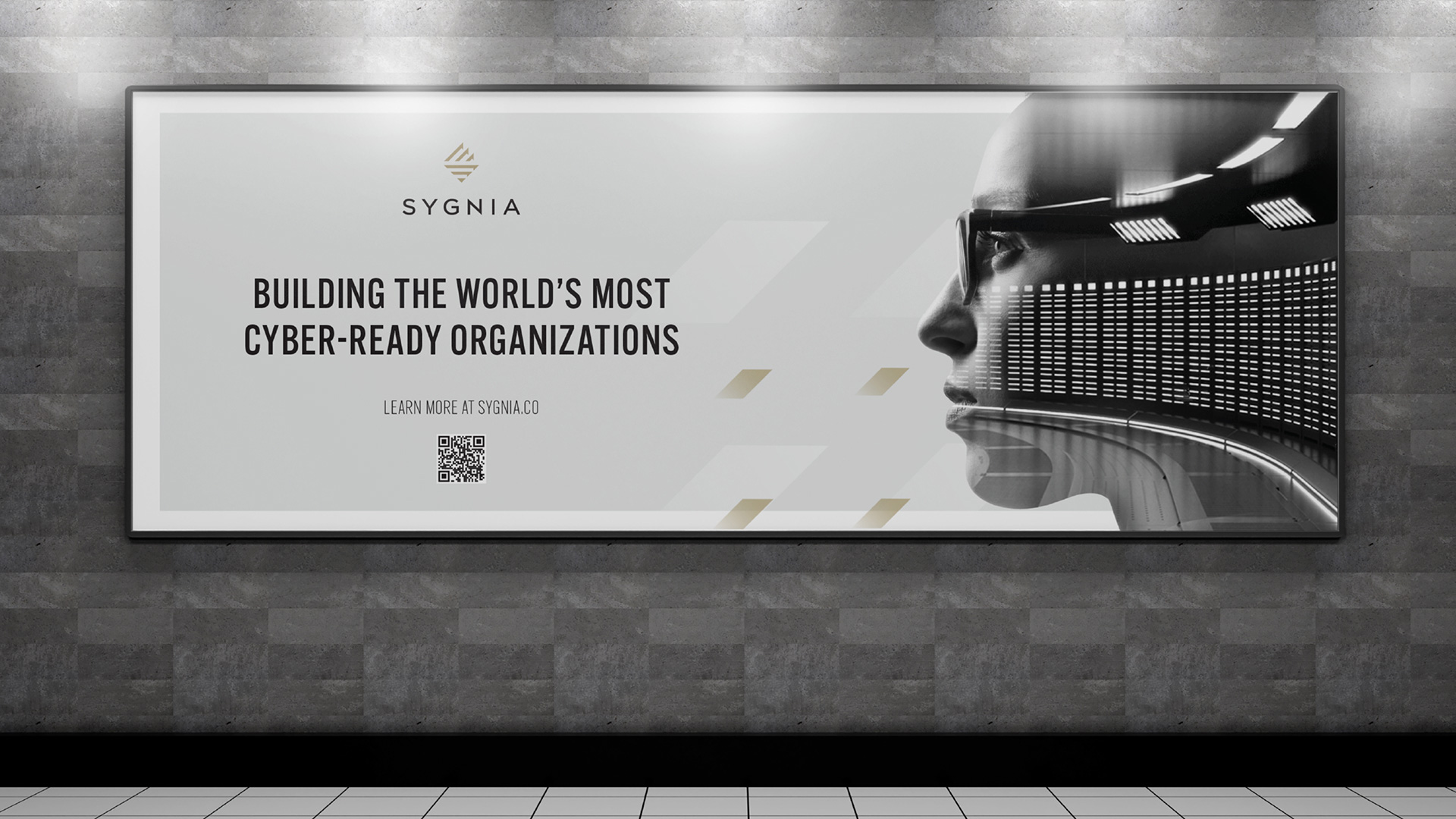 A large illuminated subway billboard displaying the Sygnia brand campaign with the headline 'Building the world's most cyber-ready organizations.'
